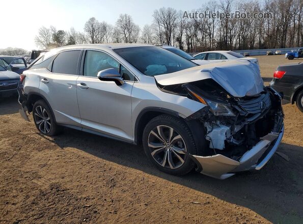 2T2BZMCA1KC182791 2019 LEXUS RX Серебряный Передняя правая четверть