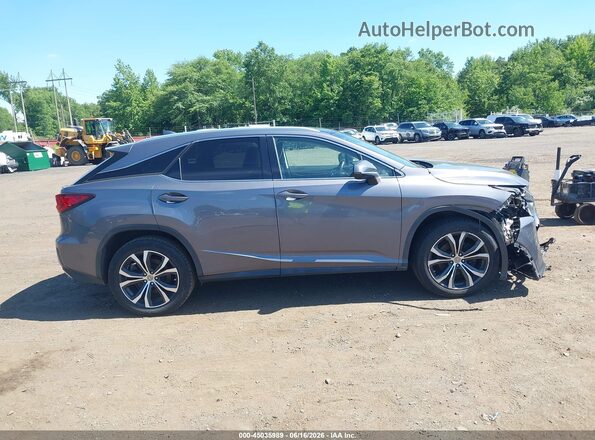 2T2BZMCA4HC087232 2017 LEXUS RX 350 Silver Widok wnętrza z tyłu