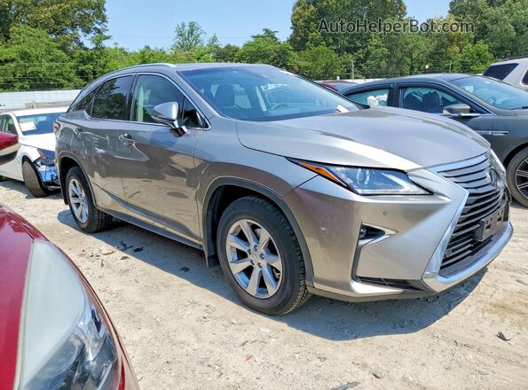 2T2BZMCA5HC111599 2017 LEXUS RX Gray Front right