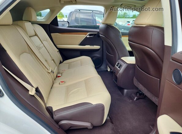 2T2BZMCA6HC098331 2017 LEXUS RX White Rear seats view
