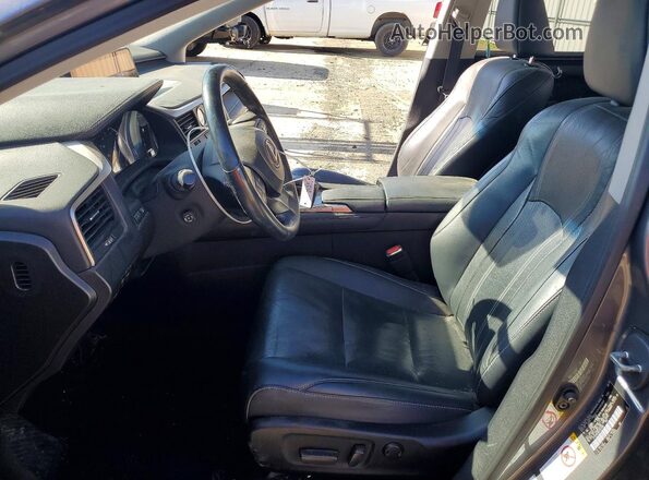 2T2BZMCA8GC023080 2016 LEXUS RX Серебряный Вид салона спереди