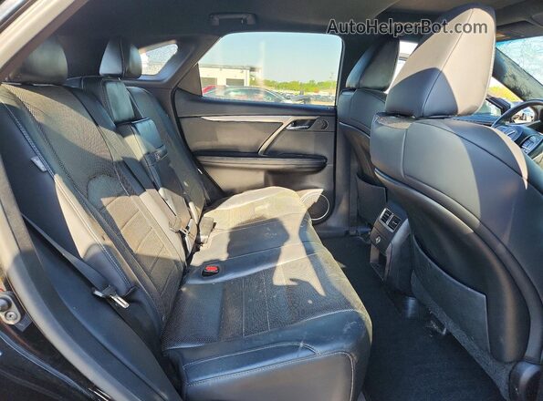 2T2BZMCA9JC136124 2018 LEXUS RX Black Widok wnętrza z tyłu