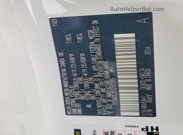 2T2GGCEZXTC107095 2026 LEXUS NX White Vista de la etiqueta del VIN