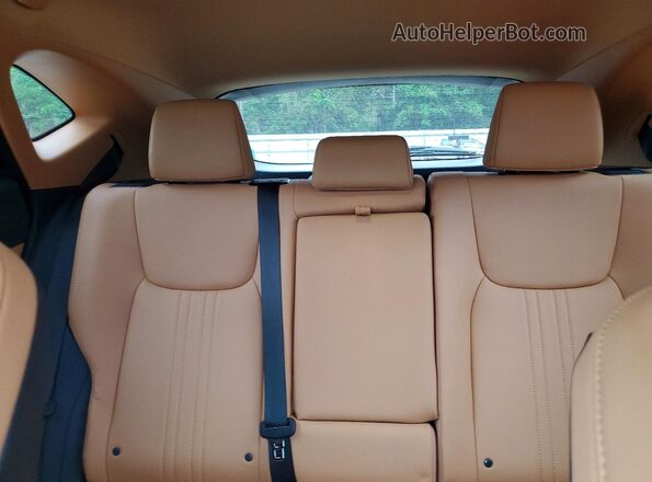 2T2GGCEZXTC107095 2026 LEXUS NX White Vista de los asientos traseros