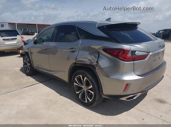 2T2ZZMCA1KC121990 2019 LEXUS RX 350 Gold Vista interior trasera