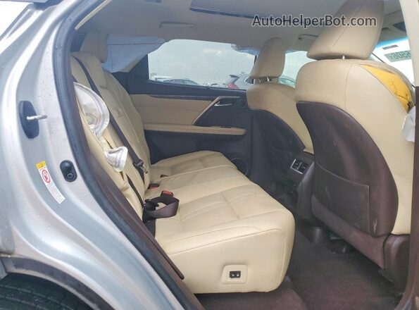 2T2ZZMCA1KC127756 2019 LEXUS RX Серебряный Вид задней части салона