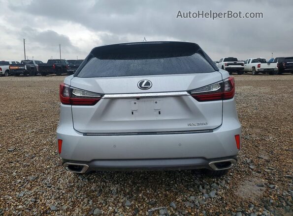 2T2ZZMCA1KC127756 2019 LEXUS RX Серебряный Вид сзади
