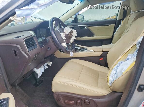 2T2ZZMCA1KC127756 2019 LEXUS RX Серебряный Вид салона спереди