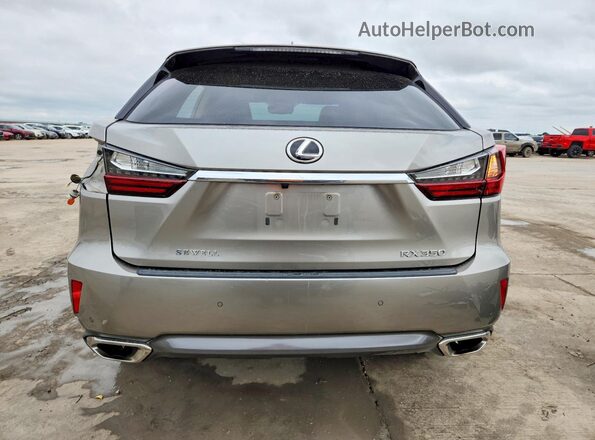 2T2ZZMCA7HC089264 2017 LEXUS RX Gold Вид ззаду