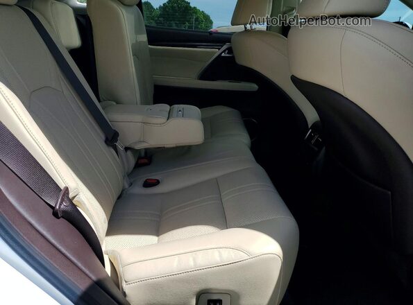 2T2ZZMCA7KC130046 2019 LEXUS RX White Rear interior view