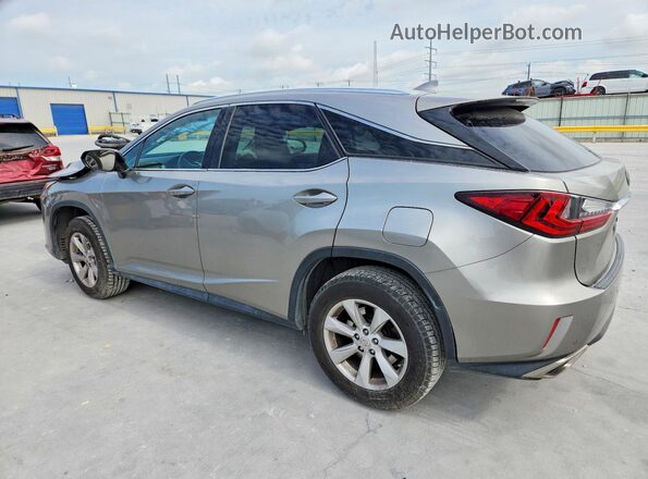 2T2ZZMCA9HC052409 2017 LEXUS RX Gray Trasero izquierdo