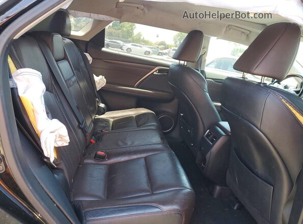 2T2ZZMCAXGC019028 2016 LEXUS RX Black Rear interior view
