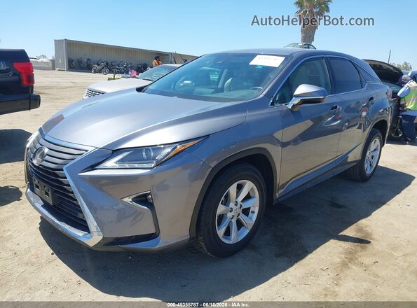 2T2ZZMCAXHC084589 2017 LEXUS RX 350 Gray Vista tres cuartos delantera izquierda