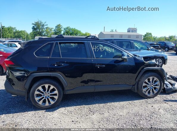 2T3A1RFV0MC179927 2021 TOYOTA RAV4 Black Սալոնի հետևի տեսք