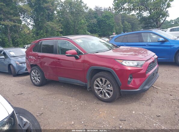 2T3A1RFV9MW177155 2021 TOYOTA RAV4 Burgundy Widok wnętrza z tyłu
