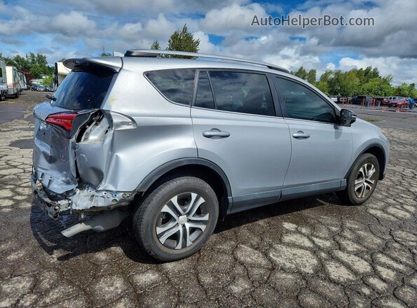 2T3BFREV0HW574105 2017 TOYOTA RAV4 Silver Rear right