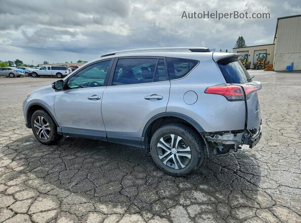2T3BFREV0HW574105 2017 TOYOTA RAV4 Silver Rear left