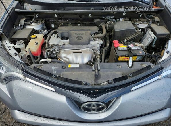 2T3BFREV0HW574105 2017 TOYOTA RAV4 Silver Rear interior view