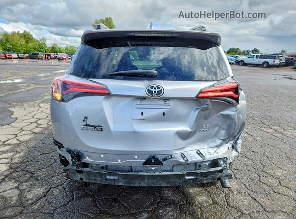 2T3BFREV0HW574105 2017 TOYOTA RAV4 Silver Rear view