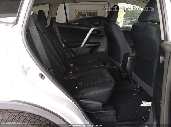 2T3BFREV0JW772995 2018 TOYOTA RAV4 White VIN კოდის სტიკერის ხედი
