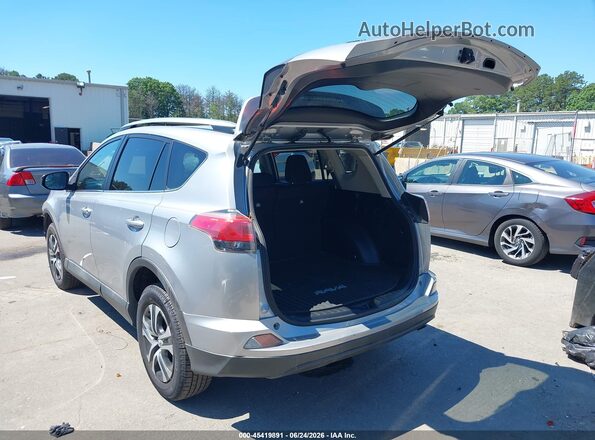 2T3BFREV1HW581273 2017 TOYOTA RAV4 Silver Tył lewy