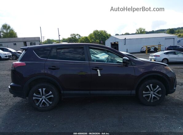 2T3BFREV1JW710196 2018 TOYOTA RAV4 Purple Widok wnętrza z tyłu