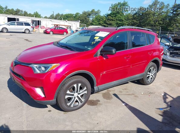 2T3BFREV2HW585719 2017 TOYOTA RAV4 Red Vista tres cuartos delantera izquierda