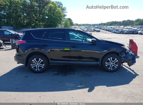 2T3BFREV2HW686940 2017 TOYOTA RAV4 Black Вид задньої частини салону