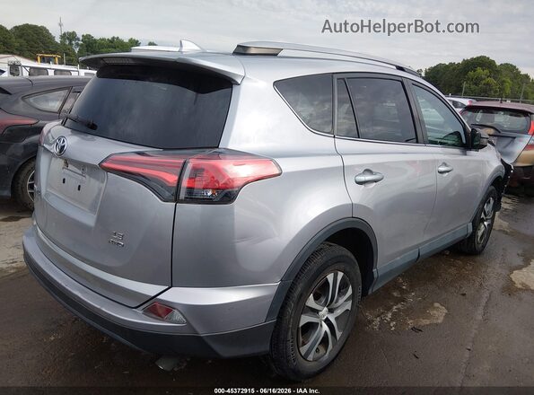 2T3BFREV2JW770312 2018 TOYOTA RAV4 Silver Trasero derecho