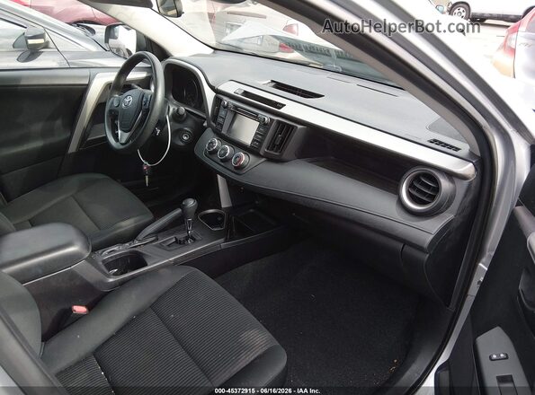 2T3BFREV2JW770312 2018 TOYOTA RAV4 Silver Vista interior delantera