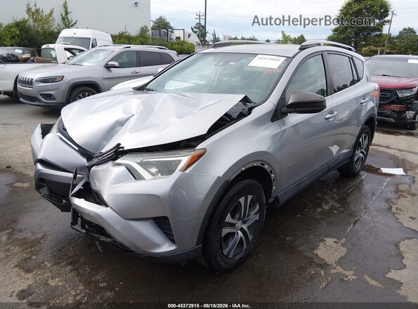 2T3BFREV2JW770312 2018 TOYOTA RAV4 Silver Vista tres cuartos delantera izquierda