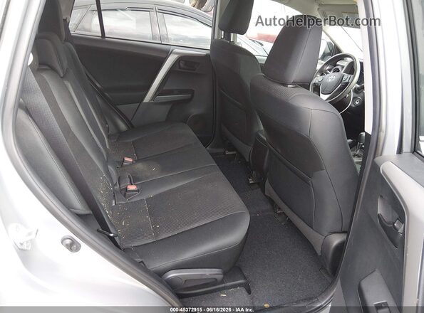 2T3BFREV2JW770312 2018 TOYOTA RAV4 Silver Vista de la etiqueta del VIN