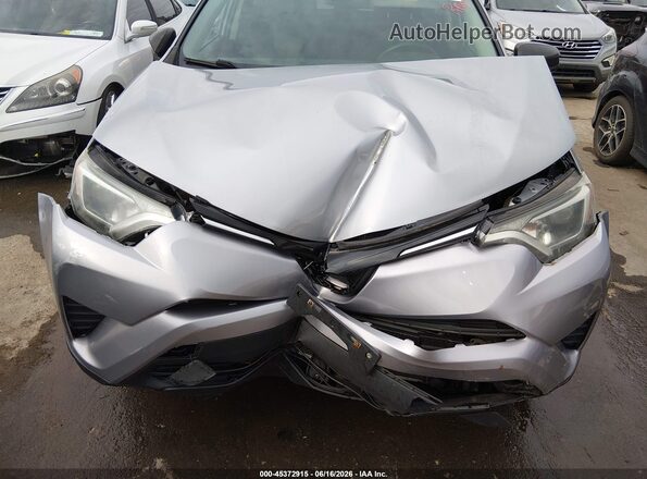 2T3BFREV2JW770312 2018 TOYOTA RAV4 Silver Vista frontal