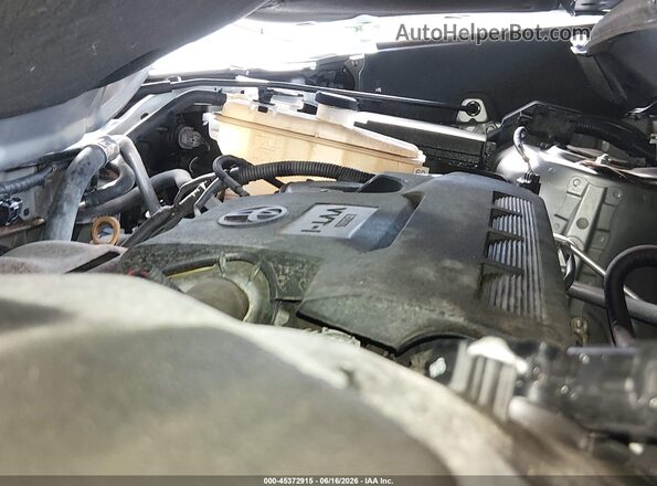 2T3BFREV2JW770312 2018 TOYOTA RAV4 Silver Vista trasera