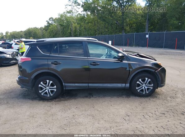 2T3BFREV3GW432152 2016 TOYOTA RAV4 Black Vista interior trasera