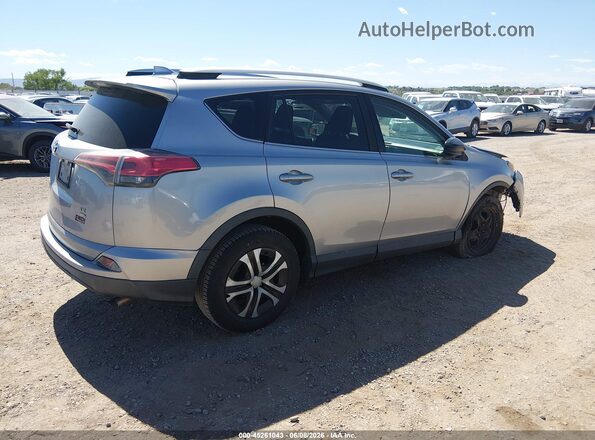 2T3BFREV3GW479567 2016 TOYOTA RAV4 Silver Rear right