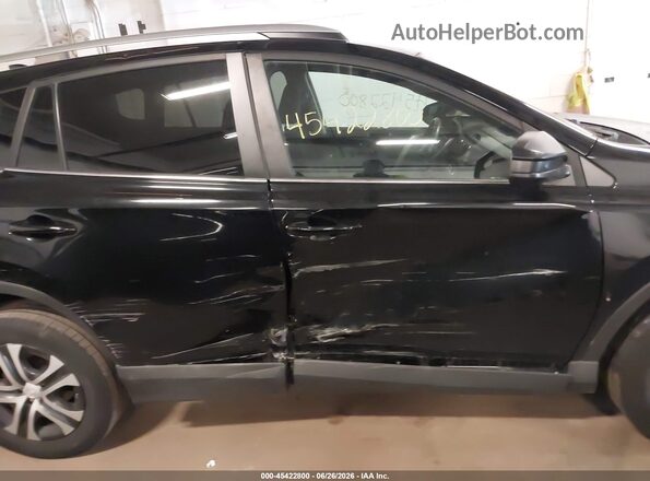 2T3BFREV3HW678202 2017 TOYOTA RAV4 Black Вид задньої частини салону