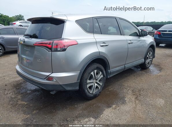 2T3BFREV3JW719983 2018 TOYOTA RAV4 Gray Tył prawy