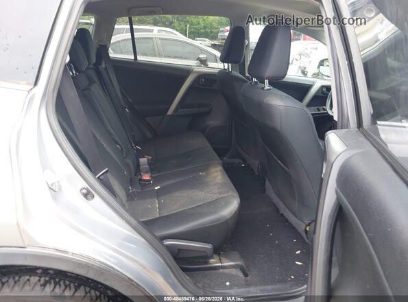 2T3BFREV3JW719983 2018 TOYOTA RAV4 Gray Widok naklejki z numerem VIN