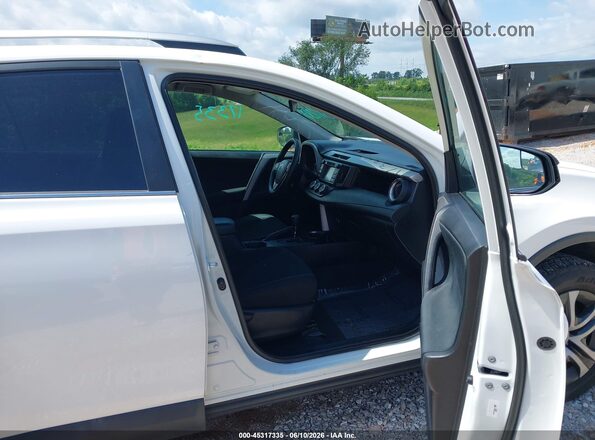 2T3BFREV5GW523391 2016 TOYOTA RAV4 White წინა სალონის ხედი