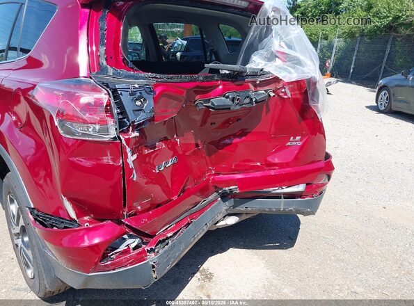 2T3BFREV5JW820989 2018 TOYOTA RAV4 Red Front view
