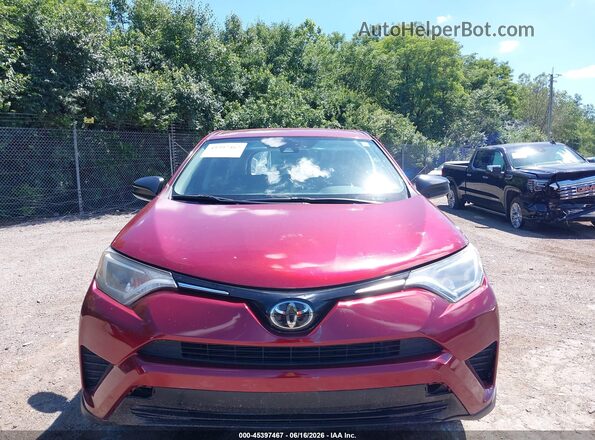 2T3BFREV5JW820989 2018 TOYOTA RAV4 Red Rear interior view