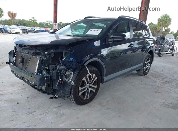 2T3BFREV6HW582595 2017 TOYOTA RAV4 Dark Blue Vista tres cuartos delantera izquierda