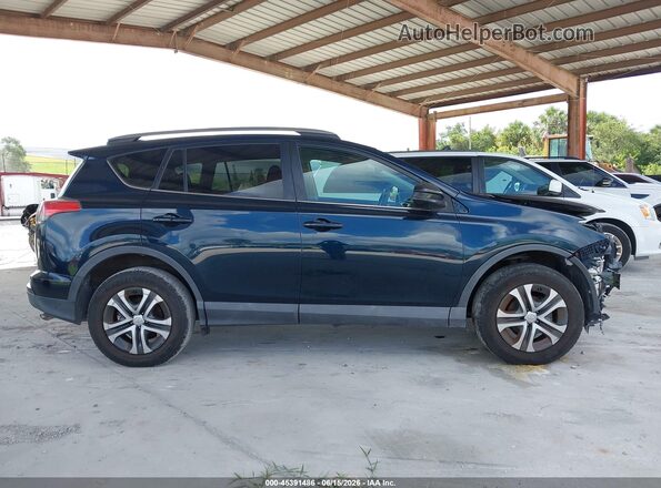 2T3BFREV6HW582595 2017 TOYOTA RAV4 Dark Blue Vista interior trasera