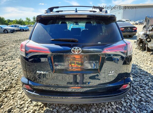 2T3BFREV6JW736793 2018 TOYOTA RAV4 Black Вид ззаду