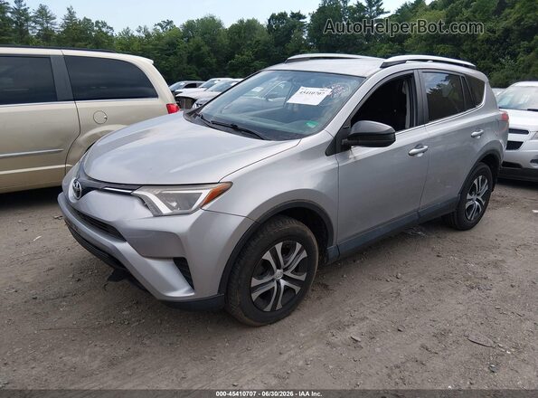 2T3BFREV9GW420264 2016 TOYOTA RAV4 Silver Front left