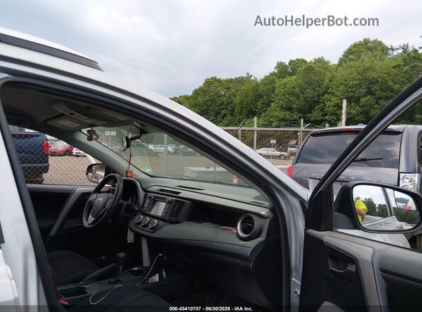 2T3BFREV9GW420264 2016 TOYOTA RAV4 Silver Front interior view
