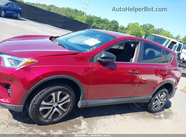 2T3BFREV9JW848584 2018 TOYOTA RAV4 Red Вид задньої частини салону