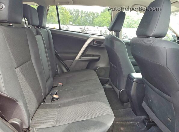 2T3BFREVXGW488394 2016 TOYOTA RAV4 Red Rear interior view