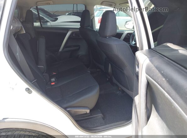 2T3BFREVXJW700850 2018 TOYOTA RAV4 White VIN კოდის სტიკერის ხედი